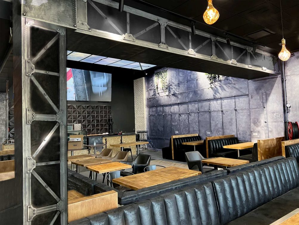 décorateur style industriel poutre Eiffel fast food